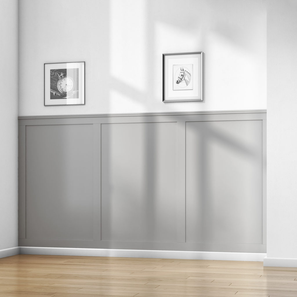 An image of the modern wall kit installed in a home with two picture frames hanging above.