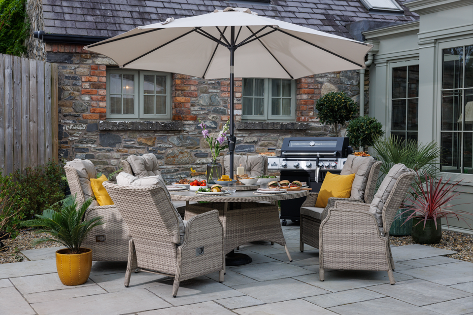 outdoor furniture with shade and barbecue