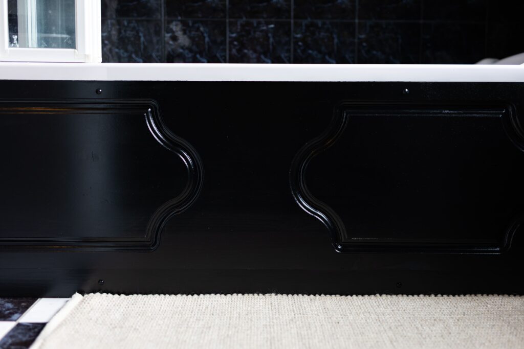 image of a black bathroom panel and woodwork 