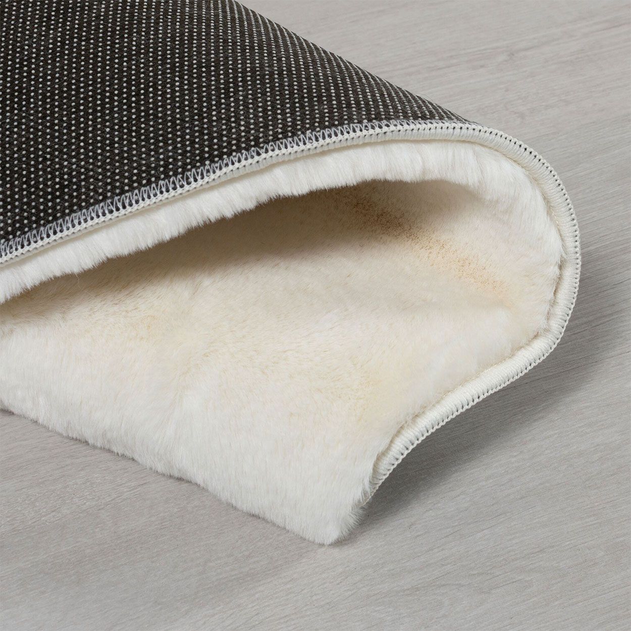 Cosy Faux Ivory Rug - 170cm x 120cm