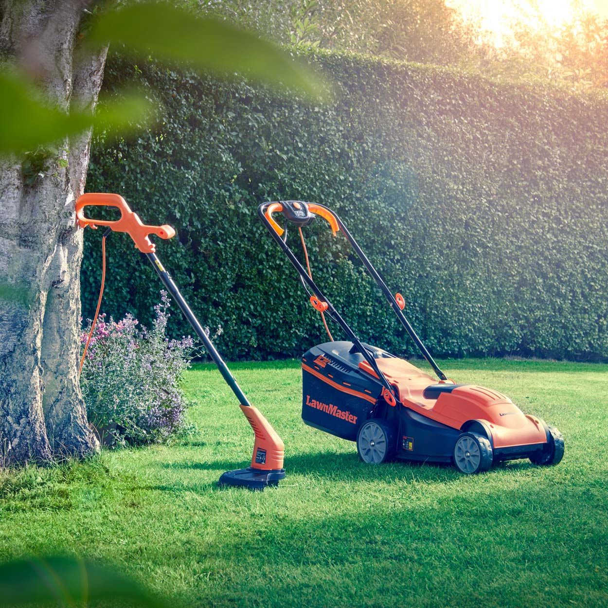 LawnMaster 1400W 34cm Electric Lawnmower and 25cm Grass Trimmer