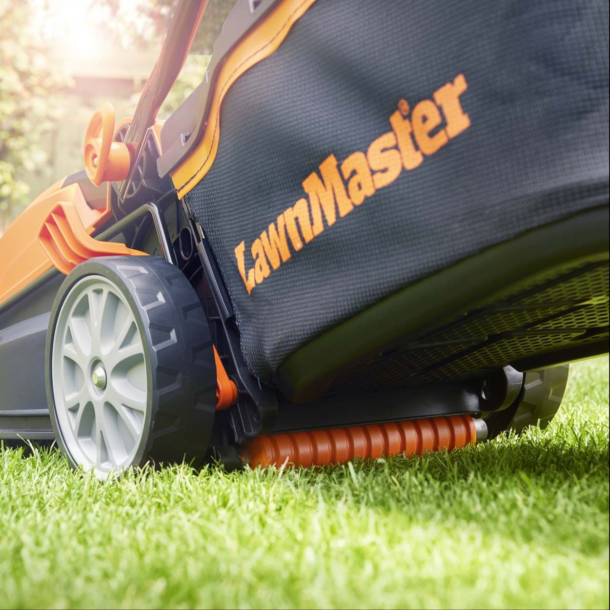 LawnMaster 1400W 34cm Electric Lawnmower and 25cm Grass Trimmer
