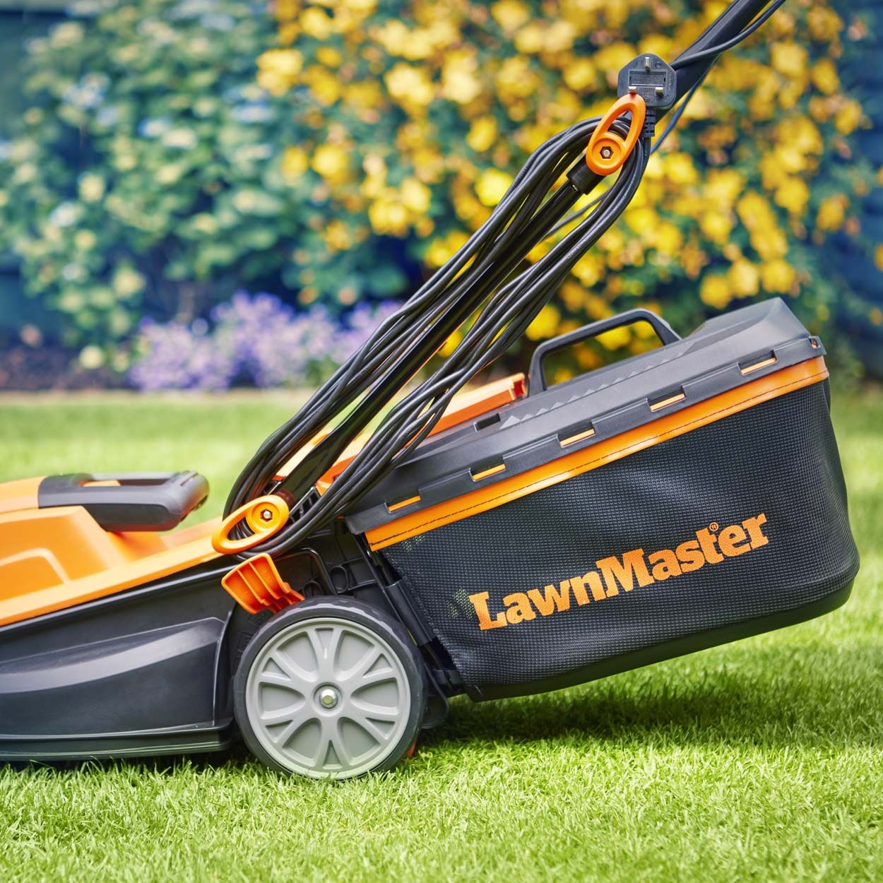 LawnMaster 1400W 34cm Electric Lawnmower and 25cm Grass Trimmer