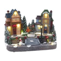 Village Scene With Rotating Skaters 24cm