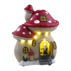 Village Scene With Rotating Skaters 24cm